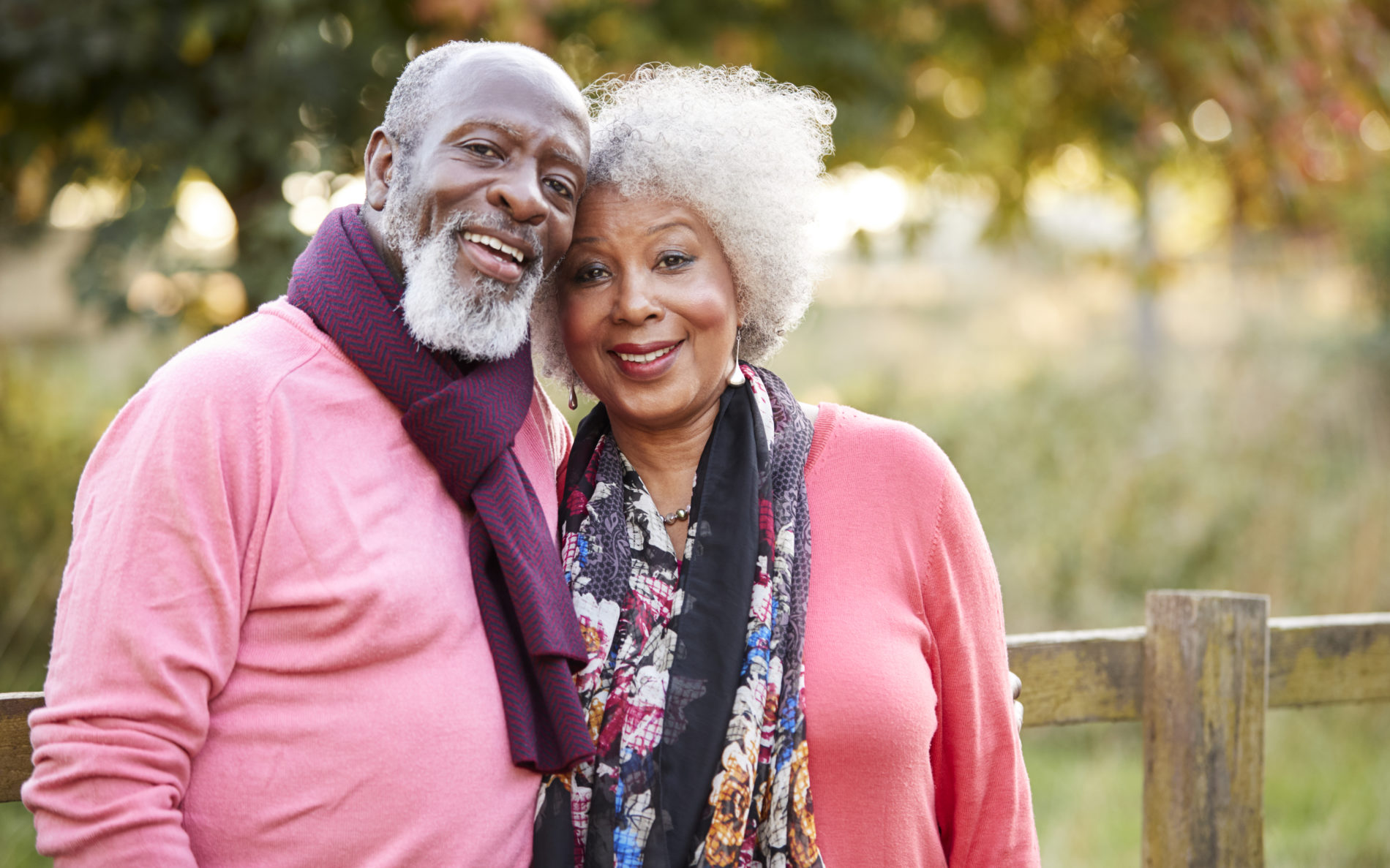 Senior couple on autumn walk in countryside