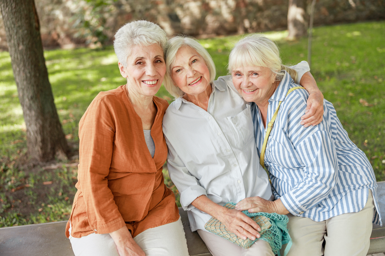 senior women sitting outdoors