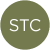 A green circle with the white capital letters 