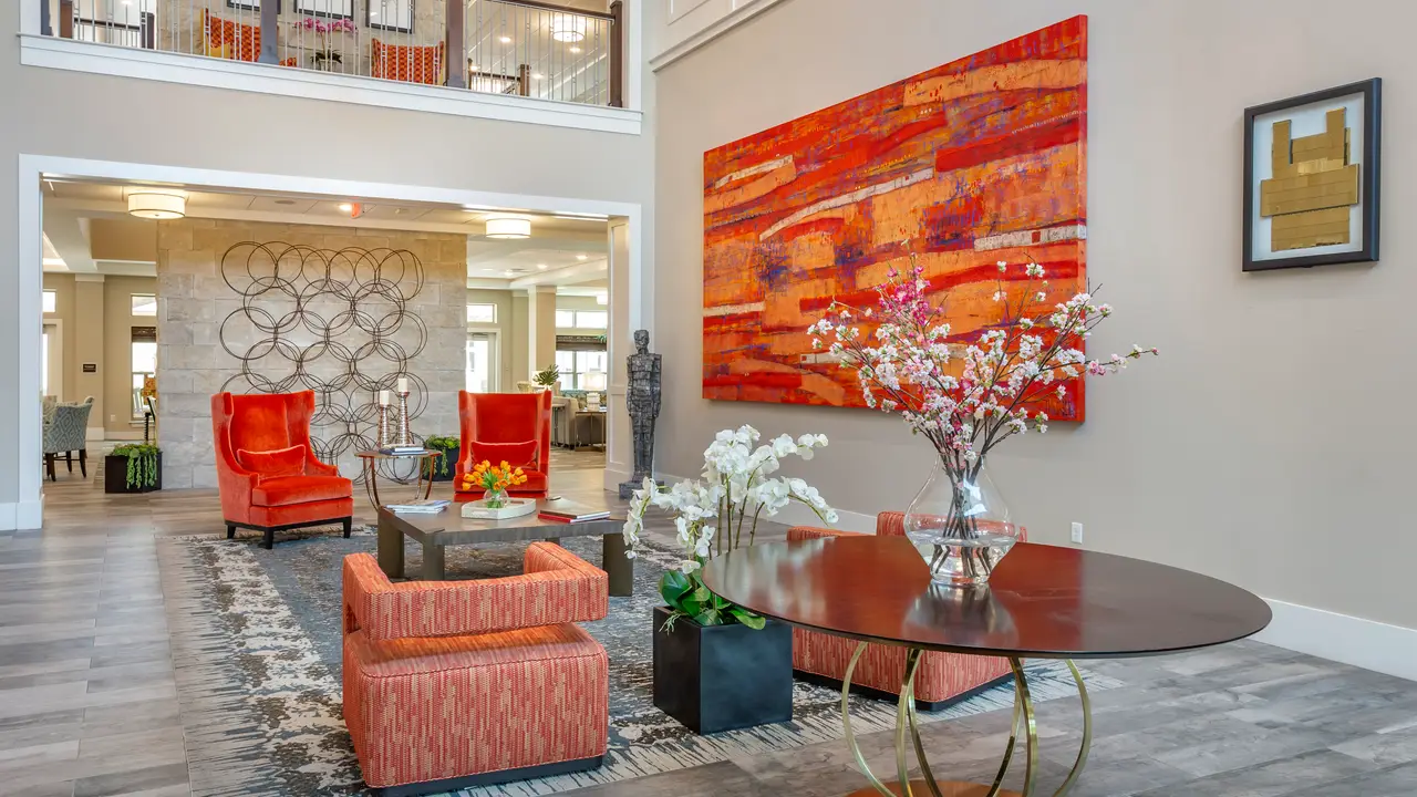 Tiffany Springs foyer sitting area with elevated ceilings and beautiful paintings