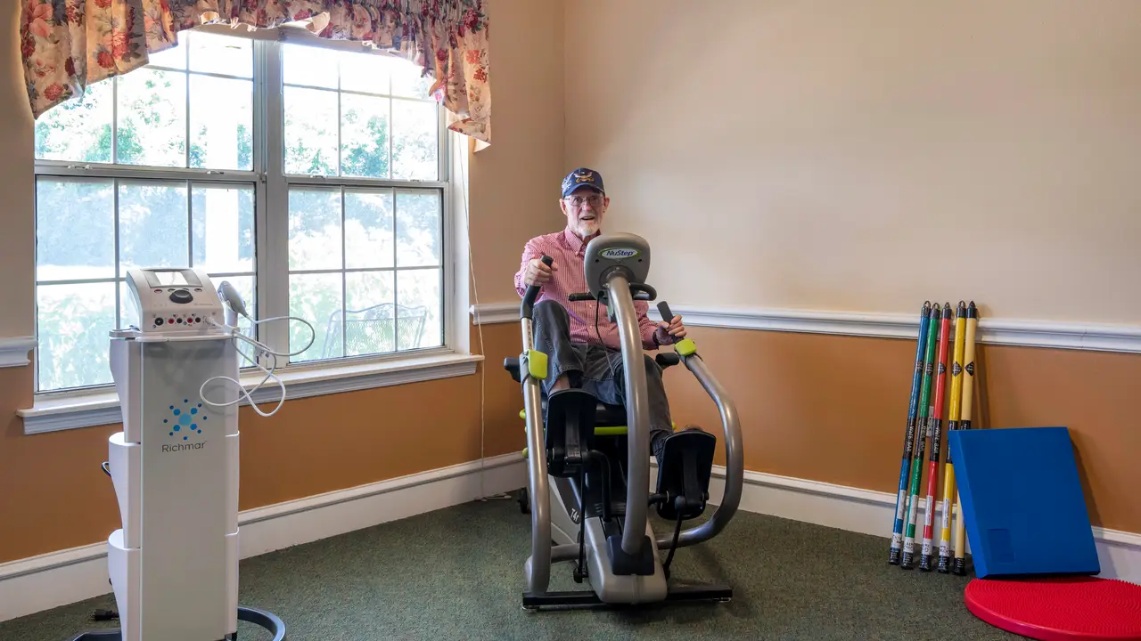 Country Gardens resident working out on machine