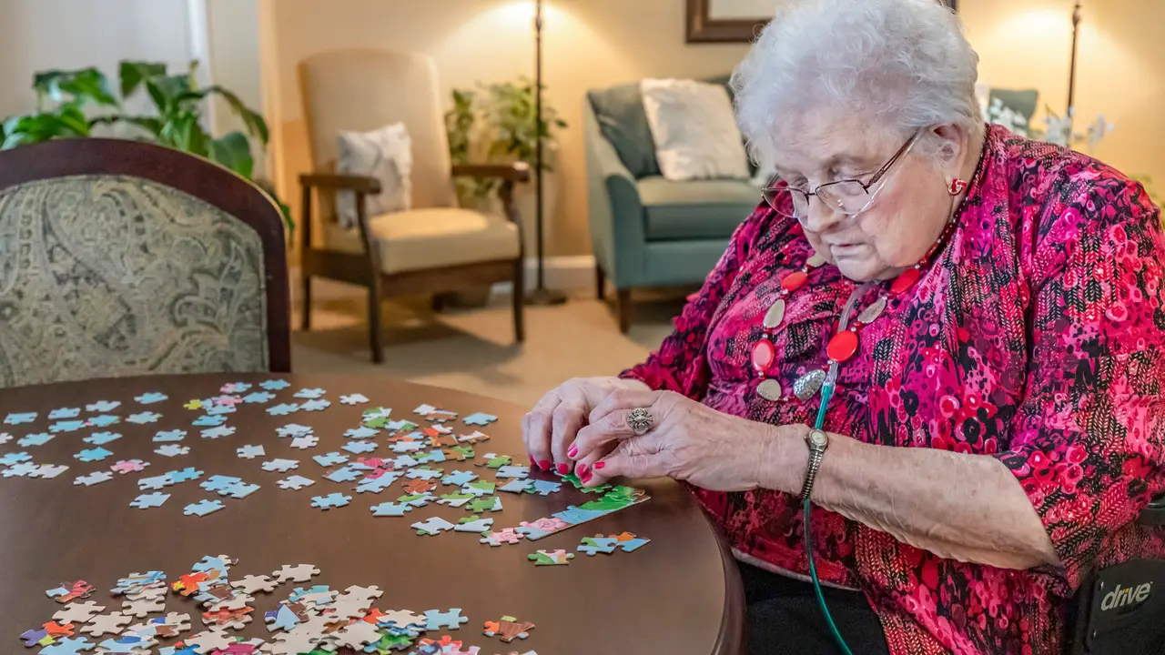Wesley resident putting together a puzzle
