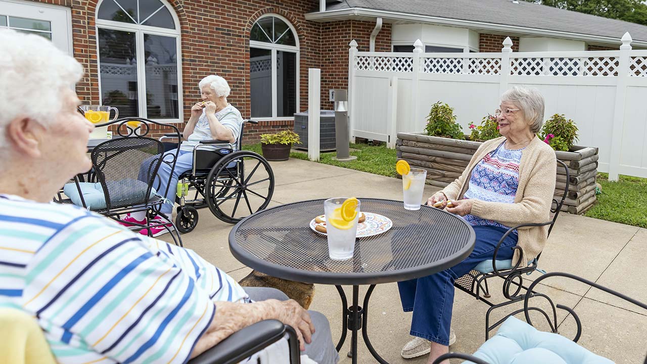 Coulterville residents drinking lemonade outside on patio