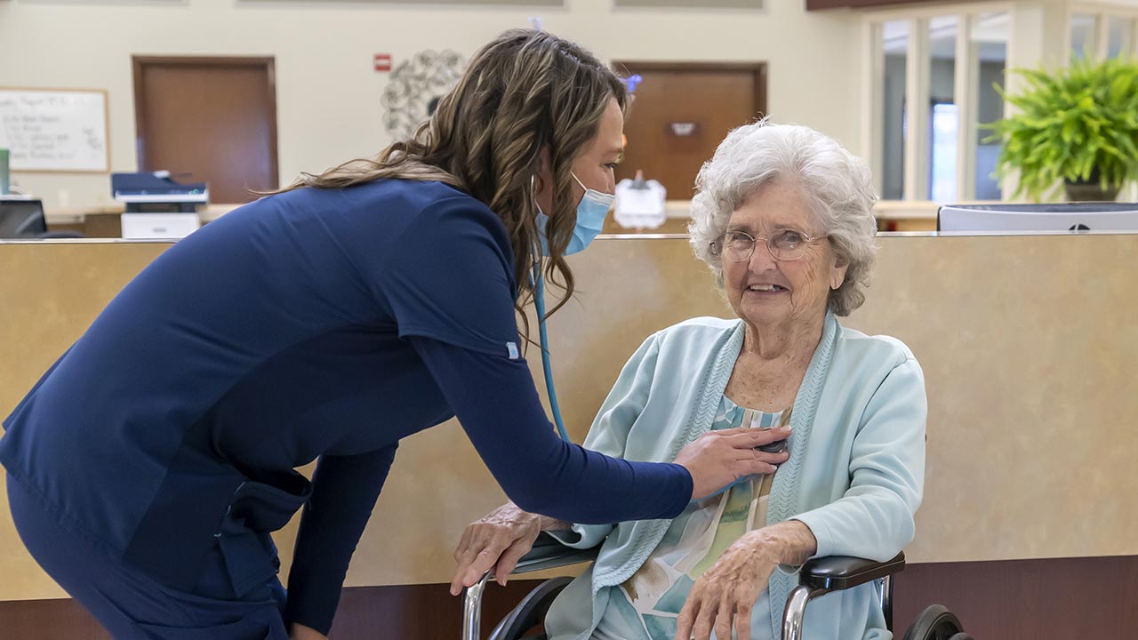 Coulterville nurse listening to senior patients heart