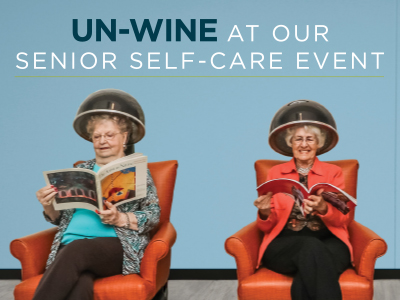 Two elderly women sit in salon chairs under hair dryers, reading magazines. The wall behind them displays the text: 