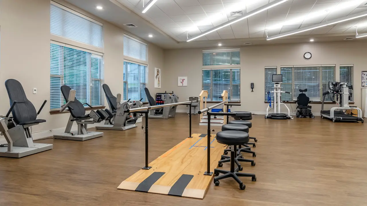 Rehabilitation room with weight machines and walking bar