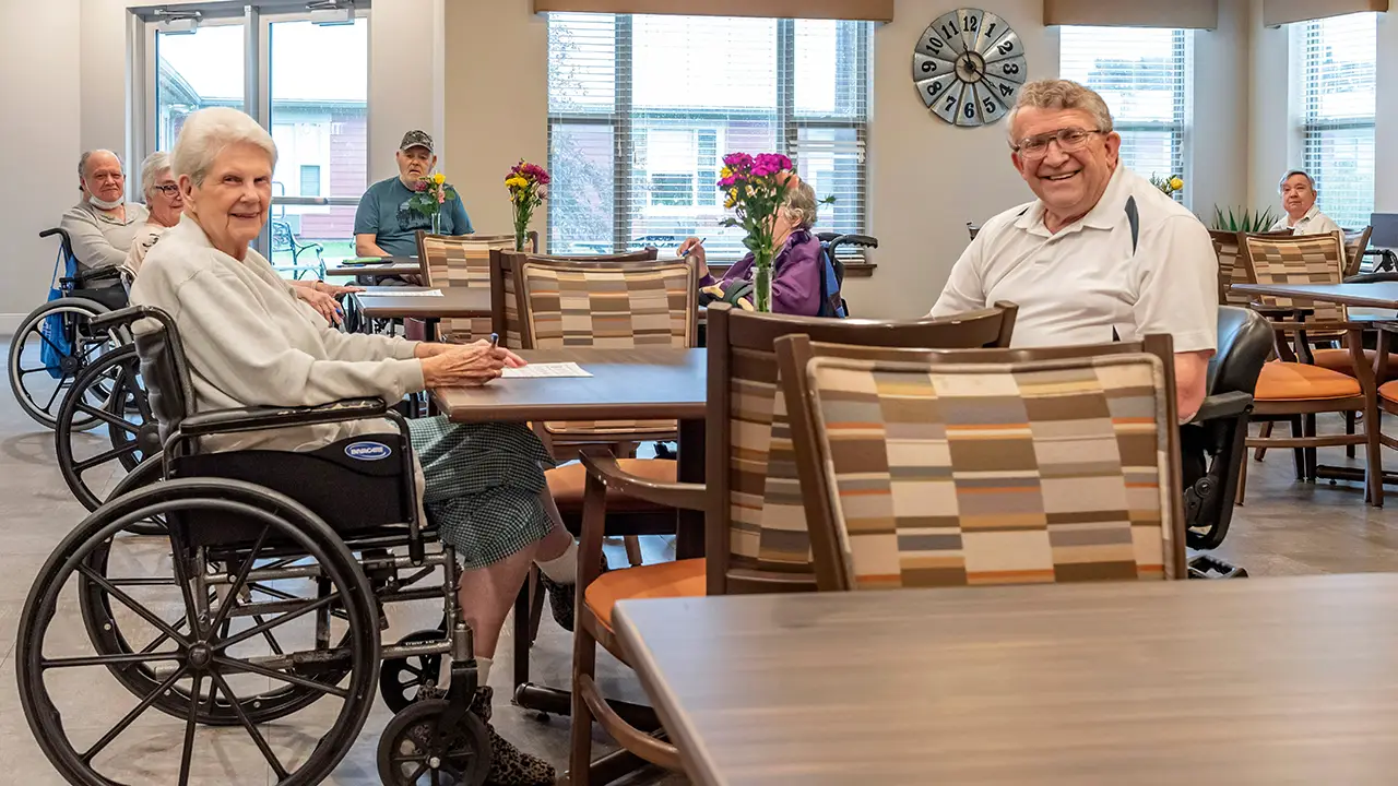 Residents smiling and playing games