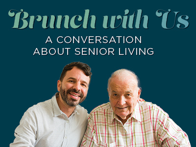 Two men, one younger and one older, smile while sitting together. Text above them reads,