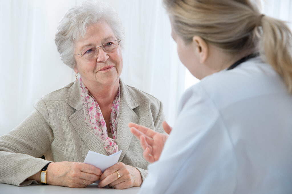 Doctor talking to patient about her prescription 