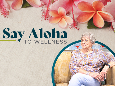 An older woman sits on a yellow couch, looking thoughtful. Above her, pink and orange tropical flowers border the top, with 