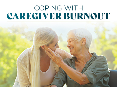 A younger woman smiles and gently touches the face of an older woman, both sharing a warm moment outdoors. Text above them reads