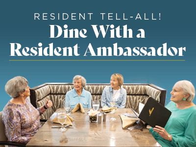Four smiling older women sit together at a restaurant table, chatting and holding menus, with text above them reading, "Resident Tell-All! Dine With a Resident Ambassador at our Assisted Living & Memory Care community.