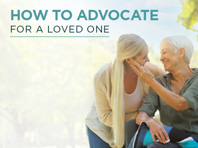 Two women, one older and one younger, smile at each other outdoors. The younger woman gently touches the older woman’s face. Text above them reads, “How to advocate for a loved one.”.