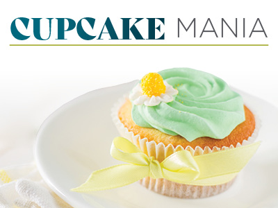 A vanilla cupcake with green frosting, topped with a yellow and white flower, sits on a white plate with a yellow ribbon tied around it—perfect for celebrating Assisted Living & Memory Care milestones. 