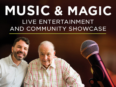 Two smiling men sit together beside a microphone at an Assisted Living & Memory Care event. The background features the text: