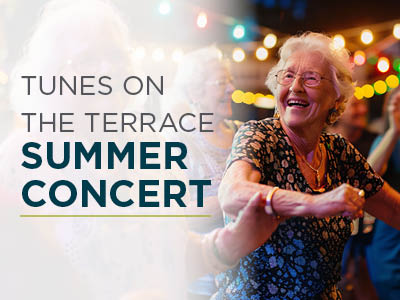 Smiling older woman dancing outdoors at night under string lights, with text overlay: 