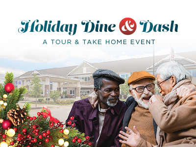 Three older adults in winter clothing laugh and hug outside a large building, with festive holiday greenery in the foreground. Text above reads,