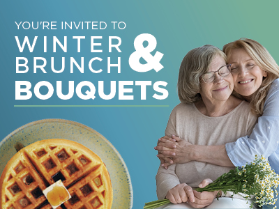 A smiling older woman and younger woman hug, holding a bouquet of flowers. Text reads