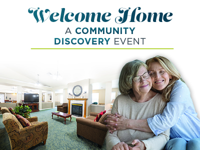 Two women smiling and hugging in a cozy, well-lit assisted living room. The text above reads,