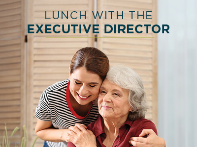 A younger woman smiles and hugs an older woman sitting in front of her. Above them, text reads 