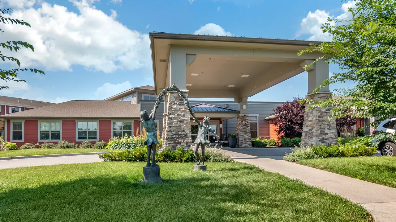 Professional healthcare wing with clear signage at Carnegie Village Rehabilitation & Health Care Center in Belton, MO, Cass County.