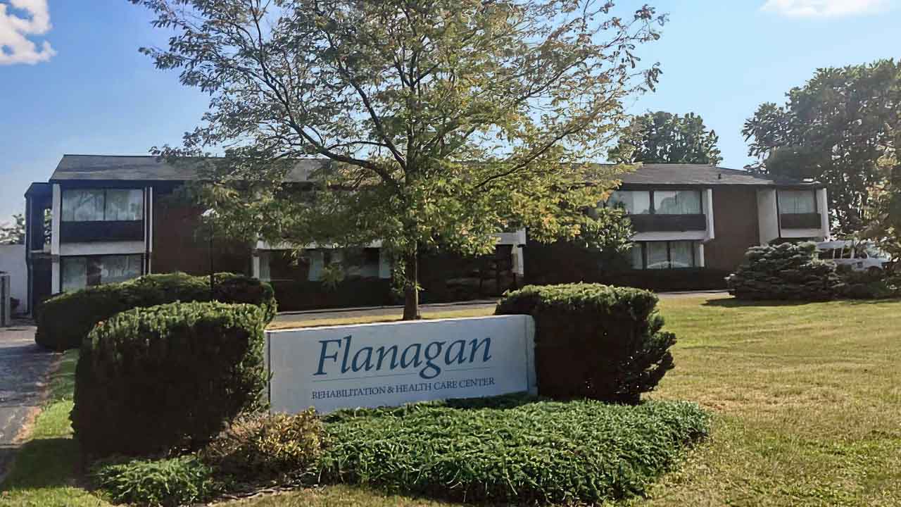 Two-story brick skilled nursing and rehab building at Flanagan Rehabilitation in Flanagan, IL, Livingston County.