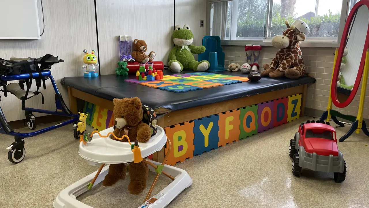 Brightly lit playroom with toys at Montgomery Children's Specialty Center in Montgomery, AL, Montgomery County.