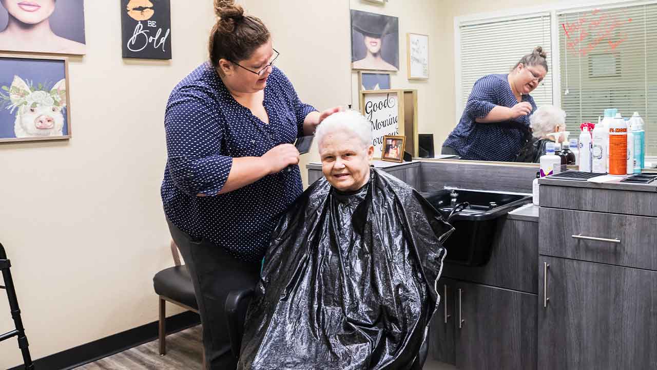 Morton Senior Living resident getting her hair done at the salon