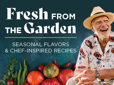 Smiling man in a hat and floral shirt sits by fresh vegetables. Text reads: