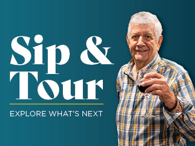 Smiling older man in a plaid shirt holding a glass of red wine stands next to text that reads: “Sip & Tour. Explore what’s next in Senior Living” on a teal background.