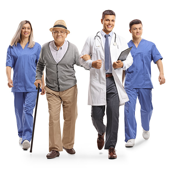 Doctor walking with nurses and patient