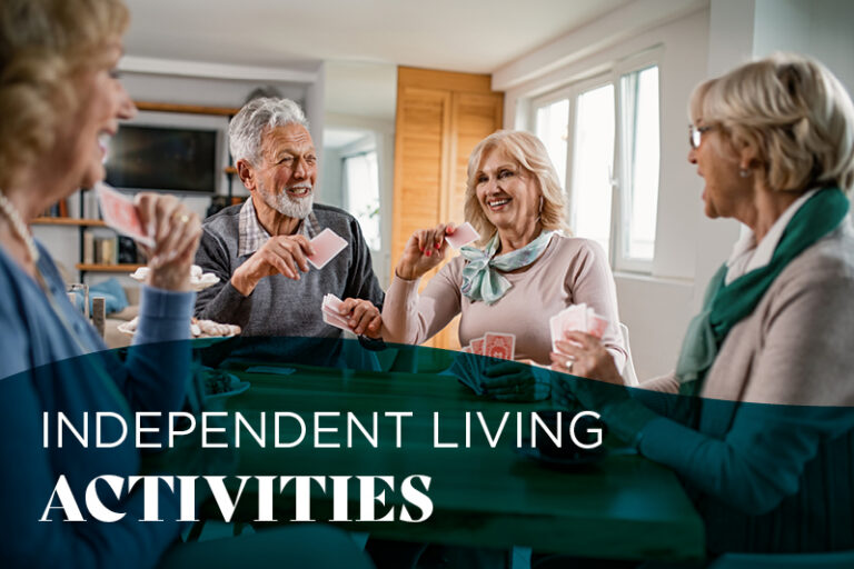 Four older adults sit around a table, smiling and playing cards together in a bright, cheerful room. The text on the image reads: "Independent Living Activities.