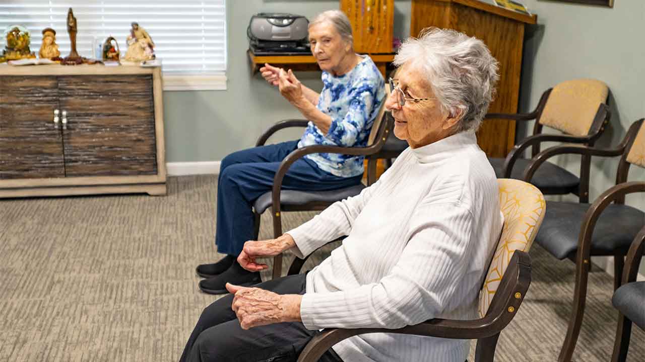 Residents exercising at Amelia Senior Living