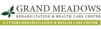 Logo of Grand Meadows Rehabilitation & Health Care Center, featuring a green and blue butterfly design on the left, and the text 