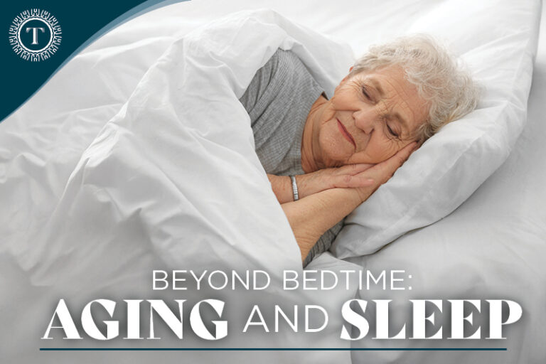 Elderly woman peacefully sleeping in a bed.