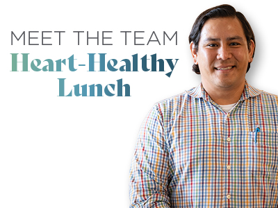 A smiling man in a checked shirt stands next to text that reads,