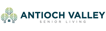 Logo of Antioch Valley Senior Living featuring three stylized trees with a house in the middle. The text 