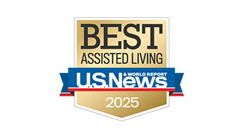 A gold, blue, red, and white badge reads “Best Senior Living Assisted Living, U.S. News & World Report, 2025.”.