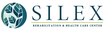 Logo for Silex Rehabilitation & Health Care Center featuring stylized green leaves inside a circle on the left, with the center’s name in large green text to the right and a thin green line underneath.