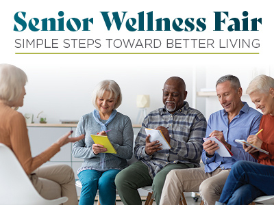 A group of older adults sits in a circle, smiling and taking notes, while a woman leads a discussion. The image promotes a