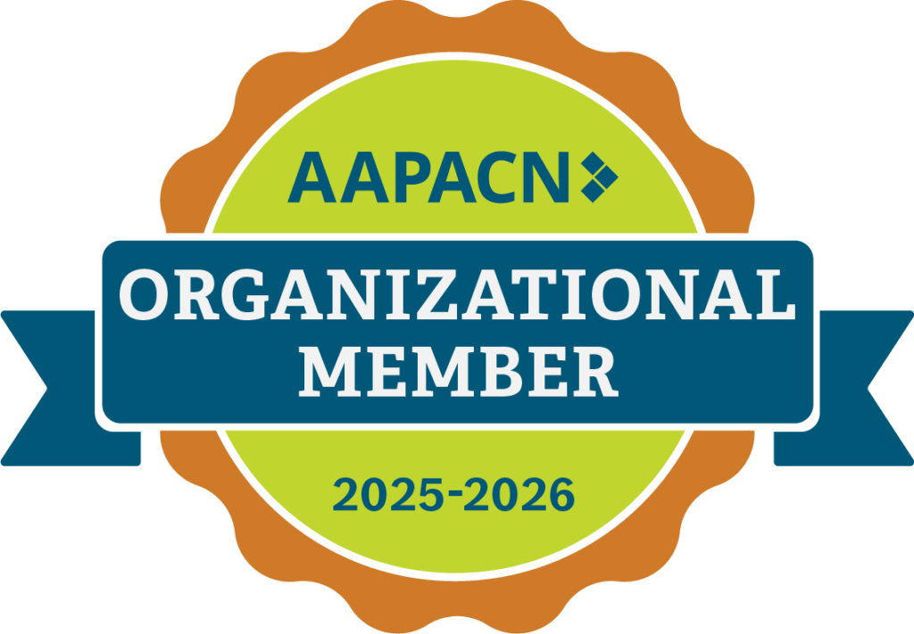 AAPACN Organizational Member badge for 2025-2026. The badge has a blue ribbon, green center, and orange border, with the text "AAPACN Organizational Member 2025-2026.