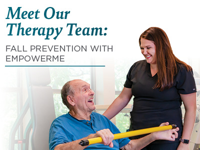 A smiling healthcare worker stands beside an older man holding a yellow exercise bar, with text reading, “Meet Our Therapy Team: Fall Prevention with EmpowerMe.”.