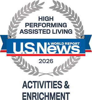 A U.S. News & World Report badge for "High Performing Assisted Living 2026" with a laurel wreath design and the words "Activities & Enrichment" below.