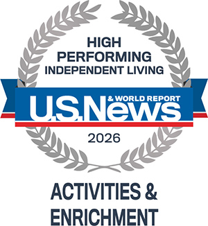 A U.S. News & World Report 2026 badge reading "High Performing Independent Living" with "Activities & Enrichment" underneath, framed by a laurel wreath graphic.