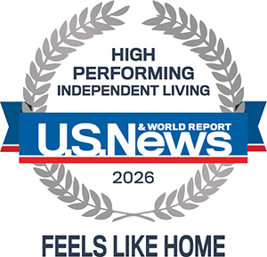 A silver laurel wreath surrounds text that reads “High Performing Independent Living, U.S. News & World Report, 2026.” Below, it says “Feels Like Home.”.