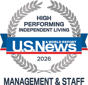 A silver laurel wreath surrounds text reading "High Performing Independent Living," with a blue banner displaying "U.S. News & World Report 2026" and "Management & Staff" below.