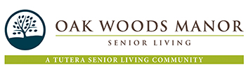 Logo for Oak Woods Manor Senior Living. On the left, there is a circular tree icon. The text reads “Oak Woods Manor Senior Living – A Tutera Senior Living Community” on white with green accents.