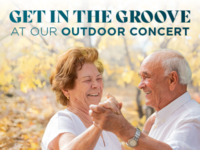 An elderly couple smiles and dances together outdoors on a sunny day. Text above them reads, 