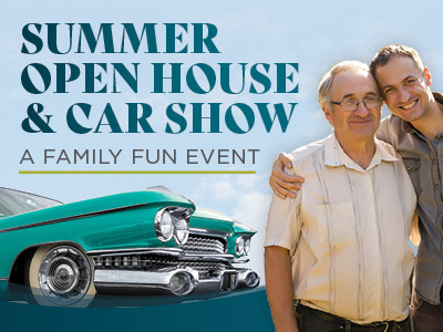 A smiling older man and a younger man stand arm-in-arm next to a classic teal car. Text reads: "Summer Open House & Car Show. A family fun event." The background is a blue sky.
