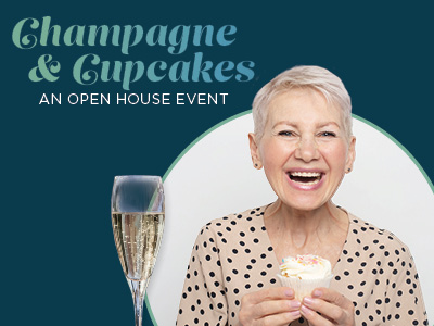 Smiling older woman holding a cupcake, next to a glass of champagne. Text reads: “Champagne & Cupcakes: An Open House Event” on a dark teal background.